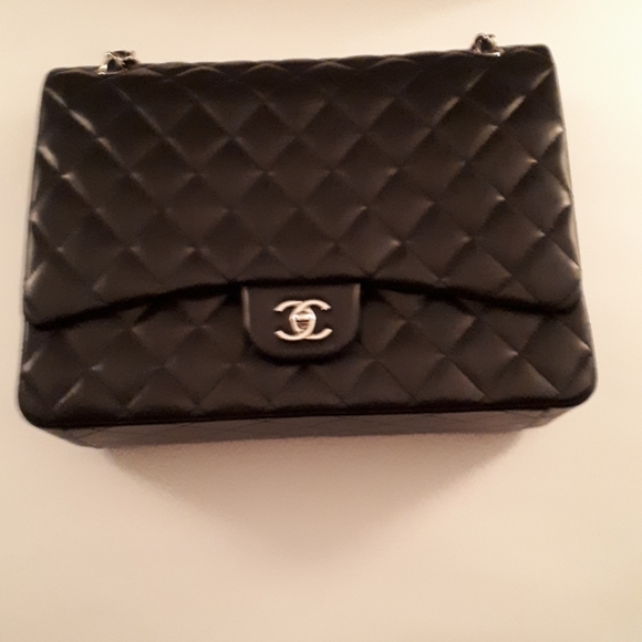 Chanel Classic double flap bag quilted in lambskin - Picture 4 of 8